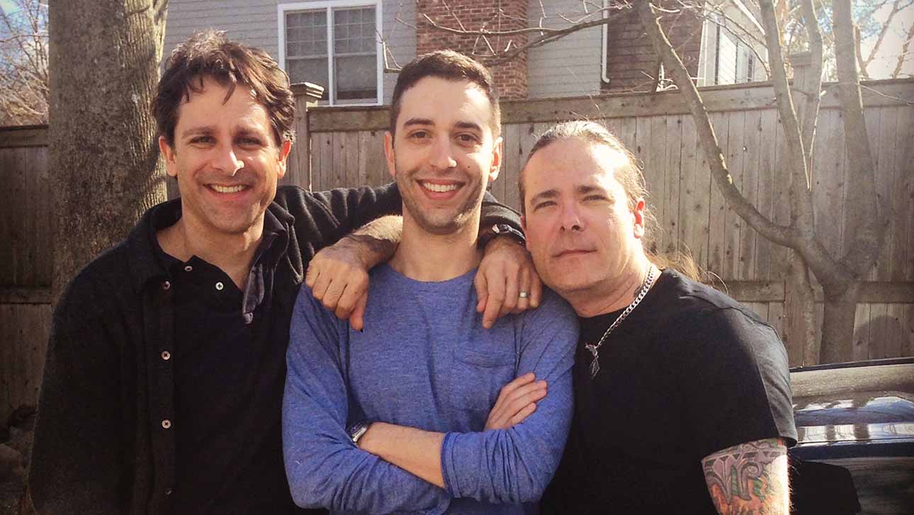 Jeremy (living with ALS) and his cousins Jon and Seth smiling  August 26, 2022 at 6:18 PM